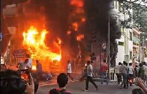 The burning EV showroom.