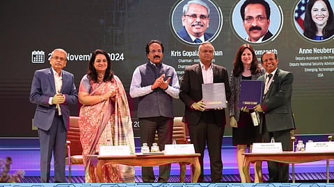 IT Minister Shri Priyank Kharge and Dr. B K Das, Director General of Electronics and Communication System, DRDO, at the Bengaluru Tech Summit 2024 with the exchange of an MoU between ITBT, Government of Karnataka, and DRDO.