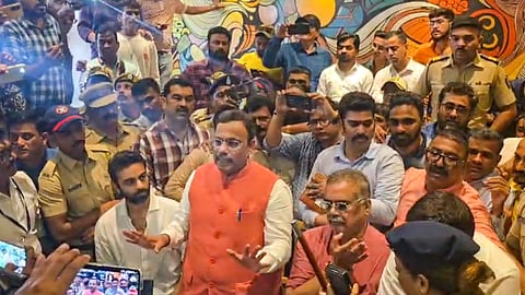 BJP leader Vinod Tawde tries to explain the case to the media after BVA workers gheraoed Tawde for allegedly distributing cash to influence voters a day before Maharashtra Assembly polls, at a hotel in Virar near Mumbai, Tuesday, Nov. 19, 2024.