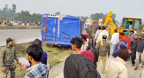 Hazaribagh: People gather near an overturned bus after an accident, in Hazaribagh district, Thursday, Nov. 21, 2024. 