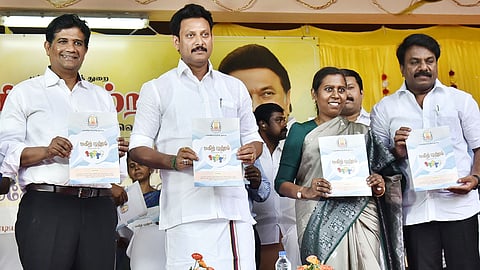 Minister Anbil Mahesh Poyyamozhi releasing the guide and logo for Magizh Mutram