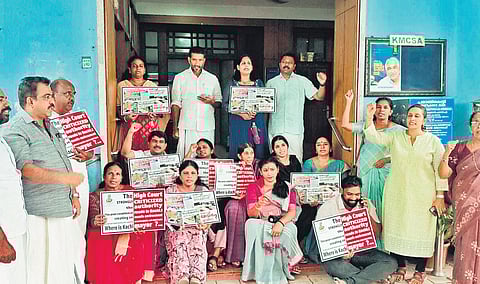 UDF councillors protest in front of the corporation office on Thursday