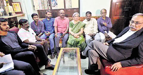Henri Tiphagne, founder of People’s Watch, in discussion with organisation members.