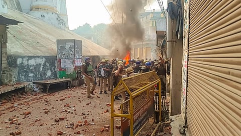 Police try to control the situation amid violence during a second survey of the Jama Masjid, claimed to be originally the site of an ancient Hindu temple, in Sambhal on Sunday.