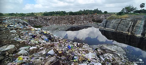 Garbage dumped in stone quarries at Pongupalayam village in Tiruppur district. 