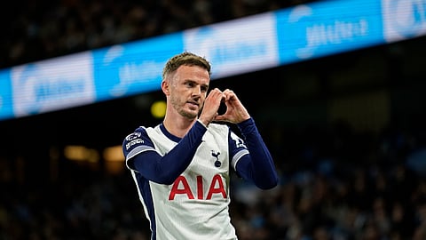 Tottenham's James Maddison celebrates after scoring his side's second goal during the English Premier League soccer match between Manchester City and Tottenham at the Etihad Stadium in Manchester.