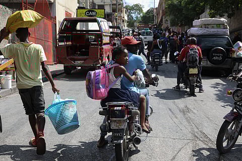 Residents flee their homes to escape gang violence in the Nazon neighborhood of Port-au-Prince.