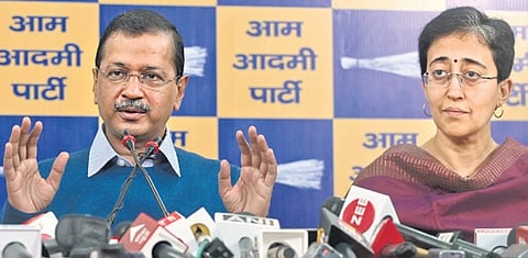 Chief Minister Atishi and AAP National Convener Arvind Kejriwal during a press conference on Monday. | shekhar yadav