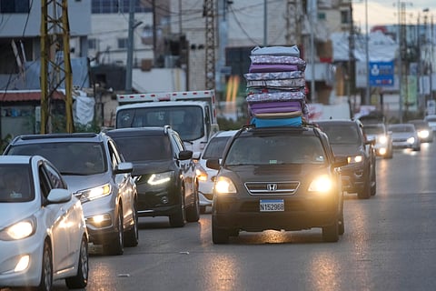  A Palestinian woman mourns as she holds the body of a relative, killed in an Israeli strike, at Al-Ahli Arab hospital, also known as the Baptist hospital, in Gaza City on November 27, 2024, amid the ongoing war in the Palestinian territory.