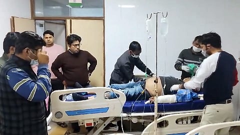 Doctors attend an injured person after an accident at the Agra-Lucknow Expressway, in Kannauj district, Uttar Pradesh, early Wednesday, Nov. 27, 2024.