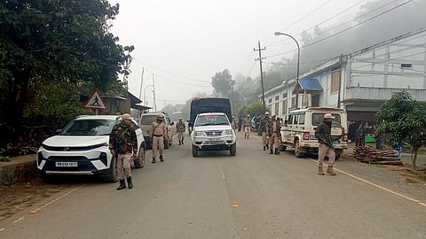 Police and security personnel during a search operation in the fringe and vulnerable areas of hill and valley districts of Manipur.