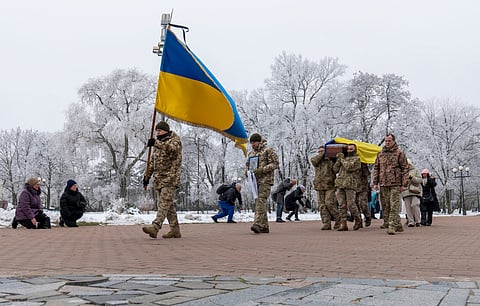 Fellow soldiers carry a coffin of leading actor of the music and drama theatre Petro Velykiy, 48, who was killed in a battle with the Russian troops in Russia's Kursk region, during farewell ceremony in Chernyhiv, Ukraine.