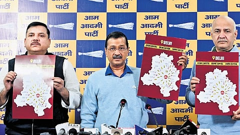 AAP national convener Arvind Kejriwal with party leaders Manish Sisodia and Sanjay Singh during a press conference in New Delhi on Thursday.