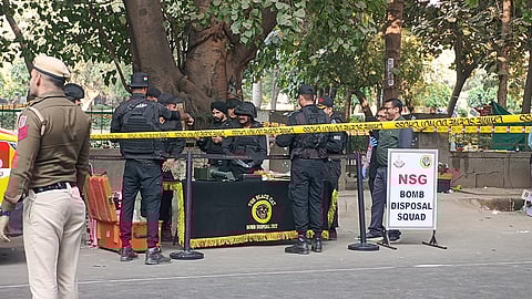 Bomb disposal squad at the blast site.