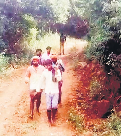 Residents carrying the girl on a doli on Thursday 