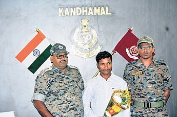 Tikes with DIG (SR) Sarthak Sarangi and Kandhamal SP Harish B 