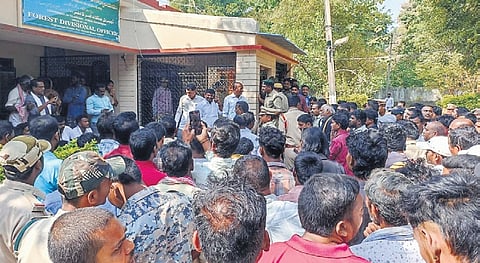 Relatives of M Laxmi protest in front of the Kagaznagar FDO in Kumurambheem Asifabad district, demanding ex gratia following her death in a tiger attack on Friday