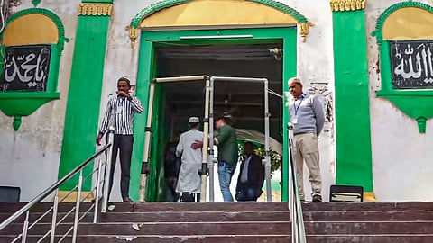 Devotees arrive at the Shahi Jama Masjid to offer prayers, in Sambhal, Friday, Nov. 29, 2024.