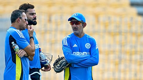 Virat Kohli (C), head coach Gautam Gambhir (R) and chief selector Ajit Agarkar speak during a practice session