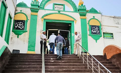 Devotees arrive at the Shahi Jama Masjid to offer prayers, in Sambhal, Friday, Nov. 29, 2024. 