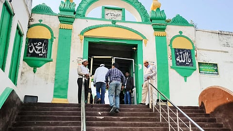 Devotees arrive at the Shahi Jama Masjid to offer prayers, in Sambhal, Friday, Nov. 29, 2024.