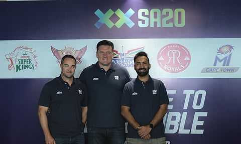 Former South African cricketers Mark Boucher, Graeme Smith with Indian cricketer Dinesh Karthik