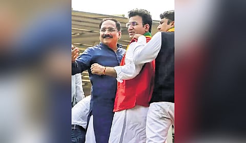 Delhi BJP president Virendra Sachdeva (centre) at a rally 