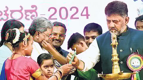 CM Siddaramaiah and DyCM DK Shivakumar at an event to mark The International Day of Persons with Disabilities, in Bengaluru on Tuesday 