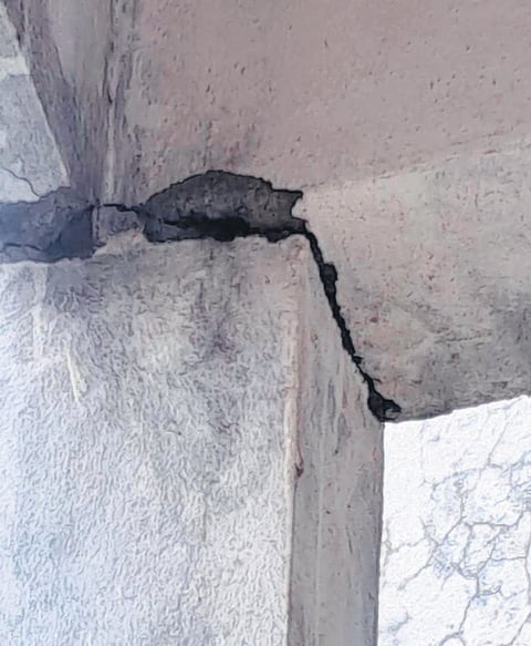 Cracks appear on a pillar due to the tremors in Rekurthi, Karimnagar, on Wednesday