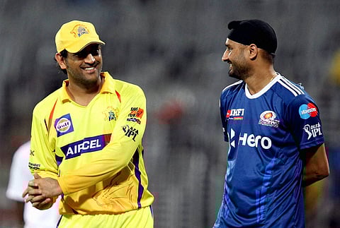 M S Dhoni with Harbhajan Singh