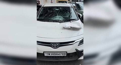 Furore broke out after a huge concrete block from the Avinashi Road elevated flyover which is under construction fell on a car today.