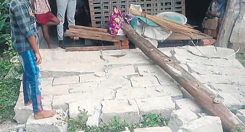 Wall of a house in Eturunagaram that collapsed due to the tremor on Wednesday 