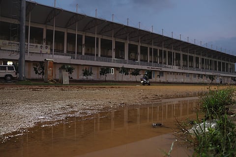 The dirt track at the sports complex damaged in rainwater, disrupting practice sessions of athletes