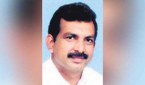 M H M Ashraf, a member of the town planning committee.