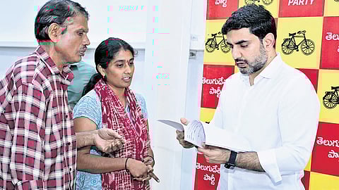 HRD and IT Minister Nara Lokesh receives petitions from the people at Praja Darbar in Undavalli on Friday
