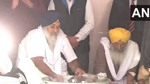 Shiromani Akali Dal leader Sukhbir Singh Badal performs 'sewa' at Gurudwara Shri Fatehgarh Sahib on Saturday.