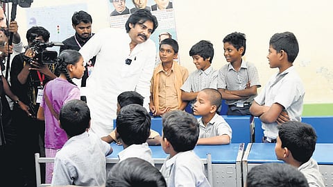 Deputy CM K Pawan Kalyan interacting with students during Mega Parent-Teacher Meet at a municipal corporation school in Kadapa on Saturday 