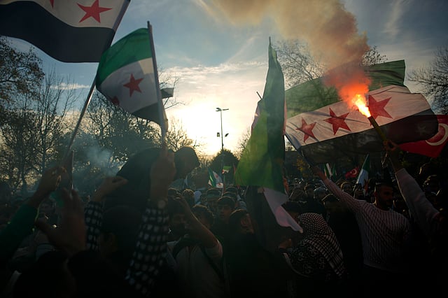 People gather to celebrate the Syrian government fall in Istanbul, Turkey, Sunday, Dec. 8, 2024. 