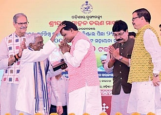 CM Mohan Majhi along with Dy CM KV Singh Deo and Revenue minister Suresh Pujari, at Sohela in Bargarh on Sunday
