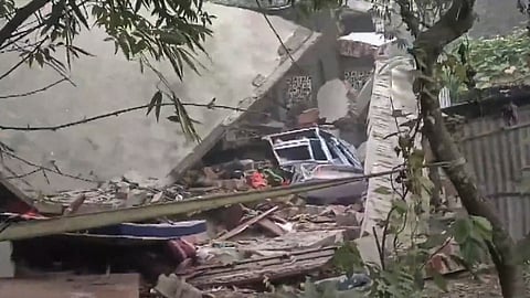 Debris at the site following bomb explosion, in Murshidabad, West Bengal, Monday.