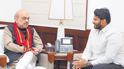 JDS leader Nikhil Kumaraswamy calls on Union Home Minister and BJP leader Amit Shah in New Delhi on Monday