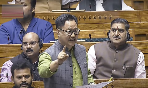 Union Minister Kiren Rijiju speaks in the Lok Sabha during the Winter session of Parliament.