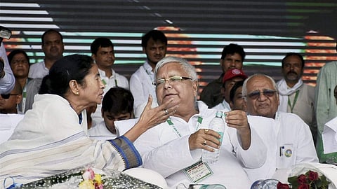 Mamata Banerjee (left) with Lalu Prasad Yadav.