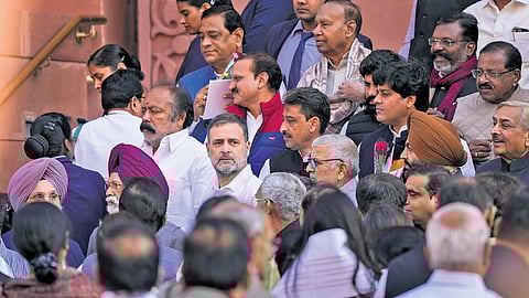 Leader of Opposition in the Lok Sabha Rahul Gandhi, along with other MPs, takes part in a protest in the Parliament House Complex in New Delhi on Wednesday.