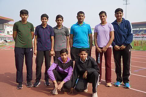 Coach Hanuman Singh's with his wards 