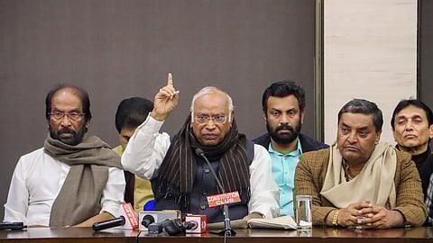 Leader of Opposition in the Rajya Sabha and Congress President Mallikarjun Kharge with MPs from INDIA bloc parties addresses a press conference, in New Delhi, Wednesday, Dec. 11, 2024. 