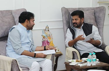 Chief Minister A Revanth Reddy (R) and Union Minister for Coal and Mines G Kishan Reddy.