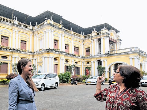 Jeanne Briganti, Public Affairs Officer of the US Consulate General, Chennai, and 
Ratna Mukherjee, strategic planning and public engagement specialist of the US Consulate General, Chennai, in front of Jayalakshmi Vilas Mansion in Mysuru on Thursday