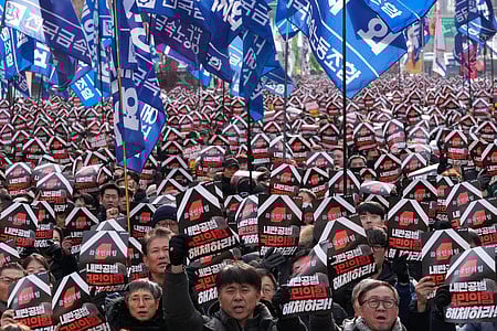 Protesters stage a rally to demand South Korean President Yoon Suk Yeol's impeachment in Seoul, South Korea, Thursday, Dec. 12, 2024. 