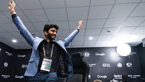 India's D Gukesh reacts after beating title-holder China's Ding Liren in the 14th and last game of the FIDE World Chess Championship 2024 in Singapore, Thursday, Dec. 12, 2024.